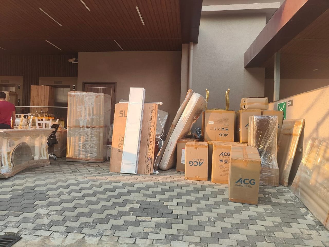 Professional packing and moving service - furniture and boxes being loaded